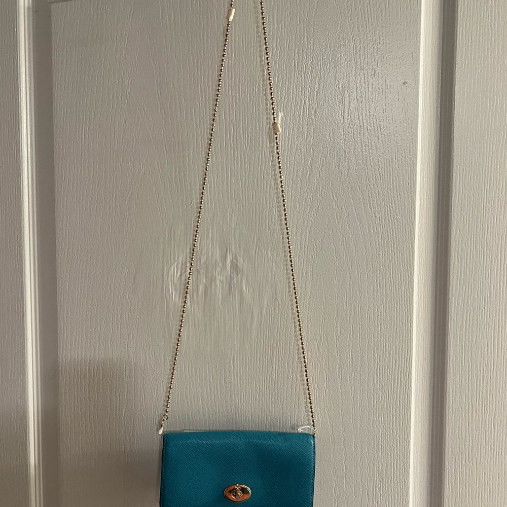 Beautiful brand new coach Crossbody evening bag very pretty turquoise color